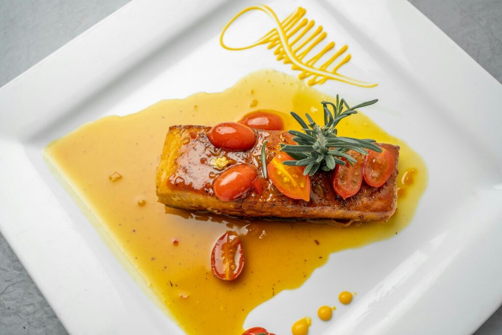 fish covered in tomatoes